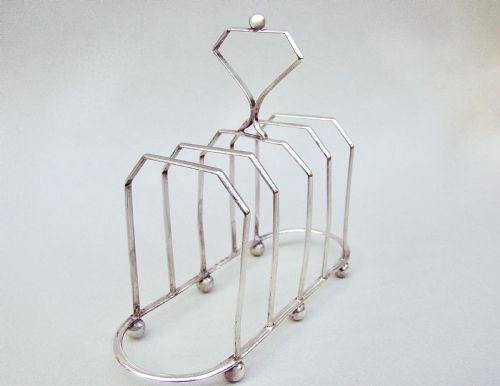 fig 1. UNUSUAL VICTORIAN SILVER FIVE DIVISION TOAST RACK BY THE WILLIAM DEVENPORT, BIRMINGHAM 1900