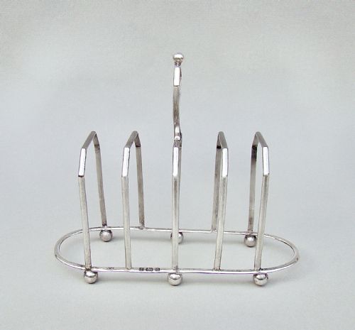 fig 2. UNUSUAL VICTORIAN SILVER FIVE DIVISION TOAST RACK BY THE WILLIAM DEVENPORT, BIRMINGHAM 1900