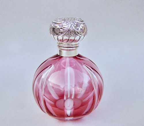 fig 1. LARGE EDWARDIAN SILVER AND CRANBERRY GLASS SCENT BOTTLE BY WALKER & HALL, SHEFFIELD CIRCA 1900