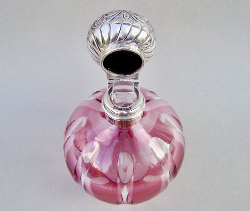 fig 2. LARGE EDWARDIAN SILVER AND CRANBERRY GLASS SCENT BOTTLE BY WALKER & HALL, SHEFFIELD CIRCA 1900
