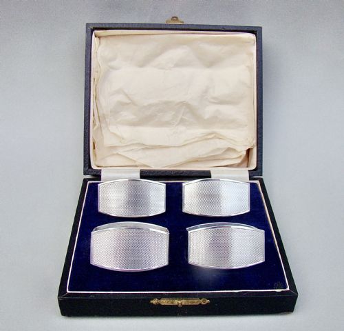 fig 1. ELEGANT CASED SET OF FOUR ART DECO SOLID SILVER NAPKIN RINGS BY F.H.ADAM & CO, BIRMINGHAM 1932