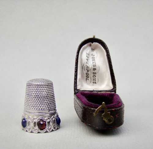 fig 1. RARE CASED CONTINENTAL SILVER THIMBLE SET WITH SEMI-PRECIOUS STONES, CIRCA 1890