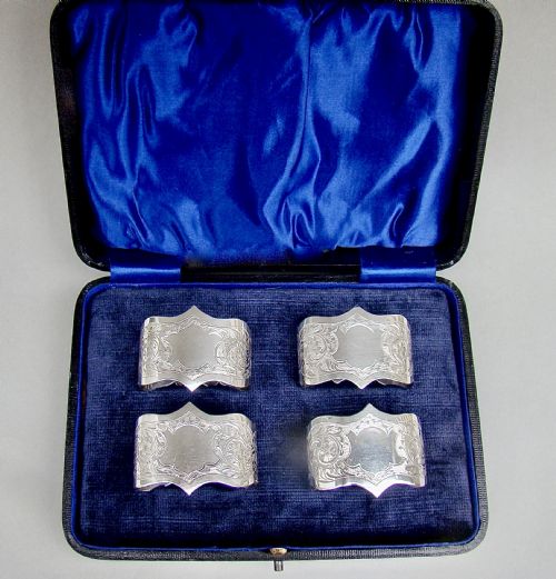 fig 1. CASED SET OF FOUR EDWARDIAN SOLID SILVER NAPKIN RINGS BY ROBERT CHANDLER, BIRMINGHAM 1904
