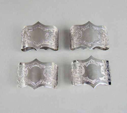 fig 2. CASED SET OF FOUR EDWARDIAN SOLID SILVER NAPKIN RINGS BY ROBERT CHANDLER, BIRMINGHAM 1904
