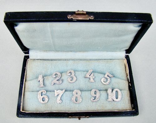 fig 1. RARE CASED SET OF DUTCH SILVER NOVELTY DRINKING GLASS MARKERS, NETHERLANDS CIRCA 1910