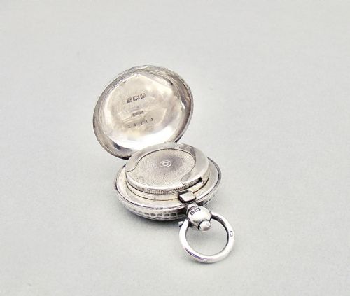 fig 4. EXQUISITE SPOT-HAMMERED SILVER SINGLE SOVEREIGN CASE BY DENNISON, BIRMINGHAM 1910