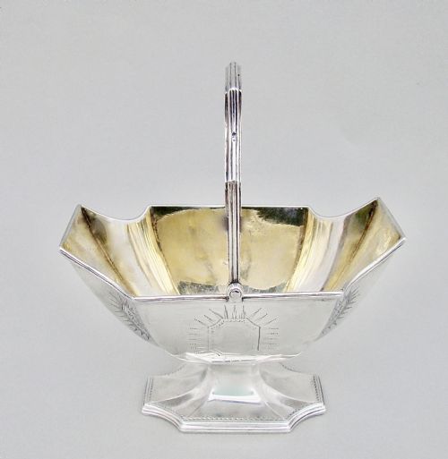 fig 1. GEORGIAN SILVER SWING-HANDLED SUGAR BASKET BY WILLIAM PLUMMER, LONDON 1789