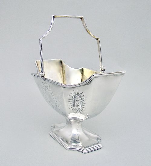 fig 3. GEORGIAN SILVER SWING-HANDLED SUGAR BASKET BY WILLIAM PLUMMER, LONDON 1789