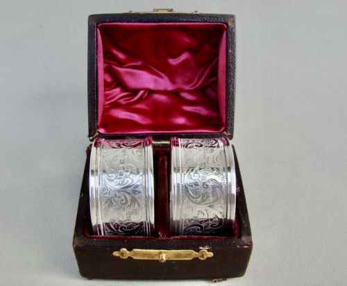 fig 1. CASED PAIR OF EDWARDIAN ENGRAVED SILVER NAPKIN RINGS BY THE ROLASON BROTHERS, CHESTER 1903