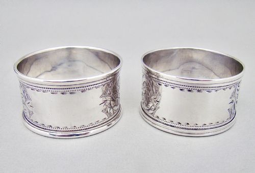 fig 2. CASED PAIR OF EDWARDIAN ENGRAVED SILVER NAPKIN RINGS BY THE ROLASON BROTHERS, CHESTER 1903