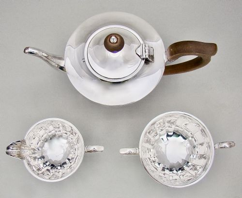 fig 2. ART DECO SOLID SILVER THREE PIECE TEA SERVICE BY HENRY CLIFFORD DAVIS, BIRMINGHAM 1931