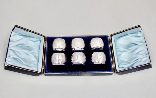 fig 1. EXQUISITE CASED SET OF SIX VICTORIAN SILVER PLATED NUMBERED AND INITIALLED NAPKIN RINGS, CIRCA 1890