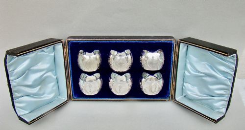 fig 2. EXQUISITE CASED SET OF SIX VICTORIAN SILVER PLATED NUMBERED AND INITIALLED NAPKIN RINGS, CIRCA 1890