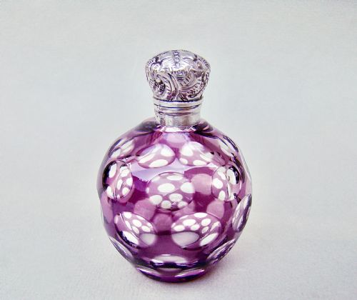 fig 1. EXQUISITE SILVER MOUNTED AMETHYST OVERLAY GLASS SCENT BOTTLE BY CHARLES MAY, BIRMINGHAM 1895