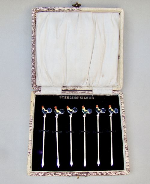 fig 1. MID-CENTURY CASED SET OF SIX STERLING SILVER ENAMELLED COCKEREL COCKTAIL STICKS, CIRCA 1950