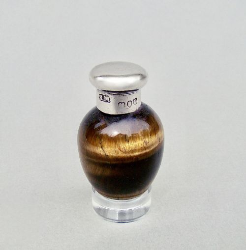 fig 1. RARE SAMPSON MORDAN SILVER MOUNTED TIGER'S EYE EGG SCENT BOTTLE, LONDON 1886