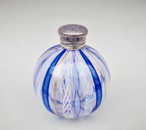 fig 1. DELIGHTFUL VICTORIAN SILVER MOUNTED TRAILED GLASS SCENT BOTTLE, CIRCA 1890