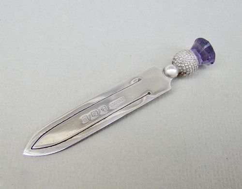 fig 1. NOVELTY SILVER & AMETHYST GLASS THISTLE BOOKMARK BY ADIE & LOVEKIN, BIRMINGHAM 1913