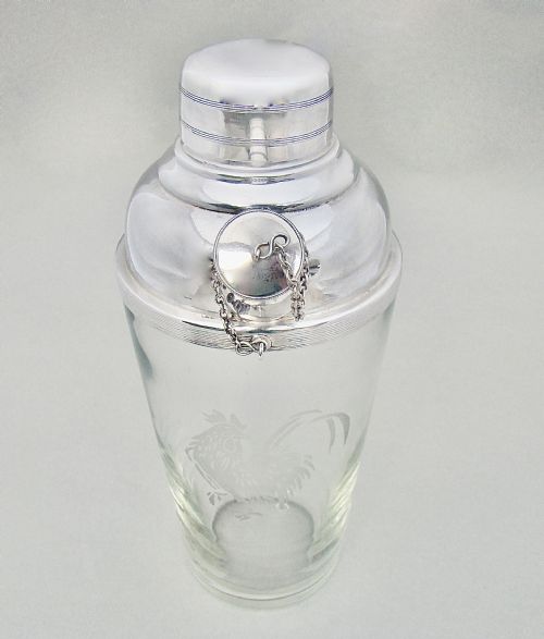 fig 1. SILVER PLATED GLASS COCKTAIL SHAKER WITH COCKEREL MOTIF BY JAMES DIXON & SONS, SHEFFIELD, CIRCA 1930
