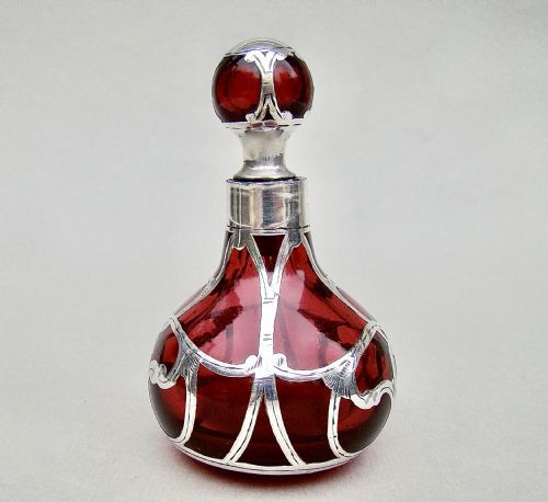 fig 1. ART NOUVEAU OVERLAY STERLING SILVER & CRANBERRY GLASS SCENT BOTTLE, CIRCA 1900