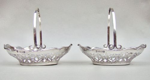 fig 1. EXQUISITE PAIR OF GEORGE V SILVER BONBON BASKETS BY ALEXANDER CLARK, BIRMINGHAM 1911