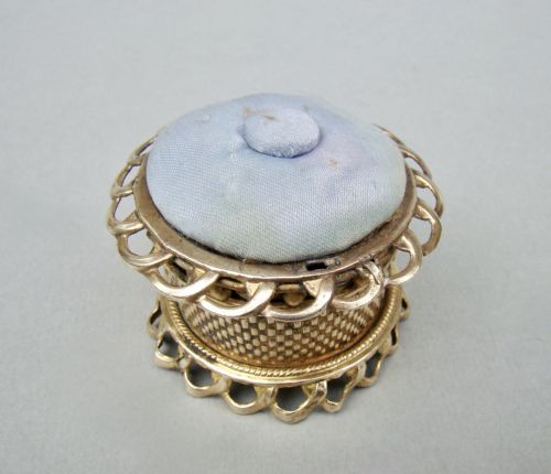fig 2. UNUSUAL MID-VICTORIAN ORMULU NOVELTY TAPE MEASURE & PIN CUSHION, CIRCA 1860