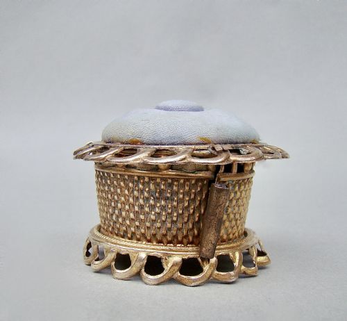 fig 1. UNUSUAL MID-VICTORIAN ORMULU NOVELTY TAPE MEASURE & PIN CUSHION, CIRCA 1860