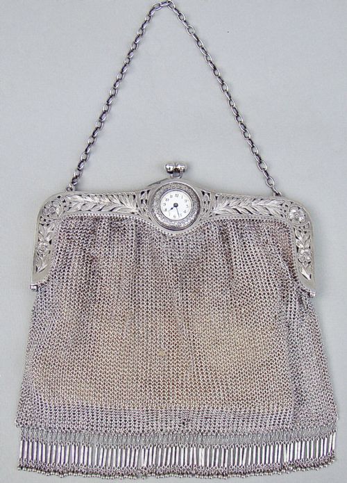 fig 1. RARE & FABULOUS ART DECO SILVER LARGE EVENING BAG INSET WITH WATCH, CIRCA 1930