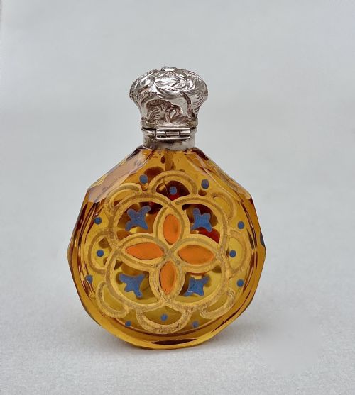 fig 1. CHARMING VICTORIAN SILVER AND ENAMELLED AMBER GLASS SCENT BOTTLE, CIRCA 1890
