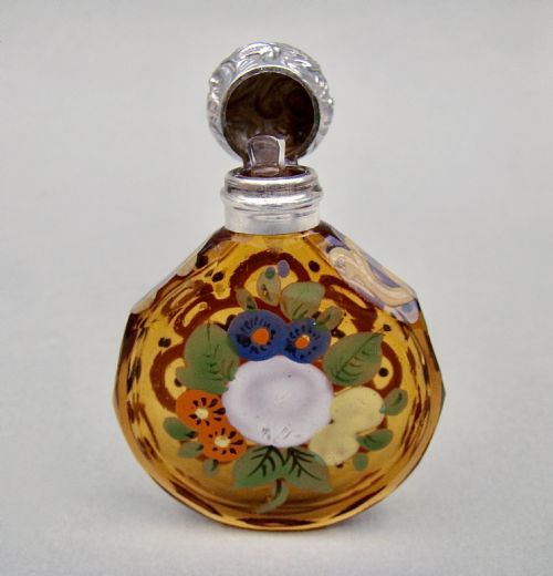 fig 2. CHARMING VICTORIAN SILVER AND ENAMELLED AMBER GLASS SCENT BOTTLE, CIRCA 1890
