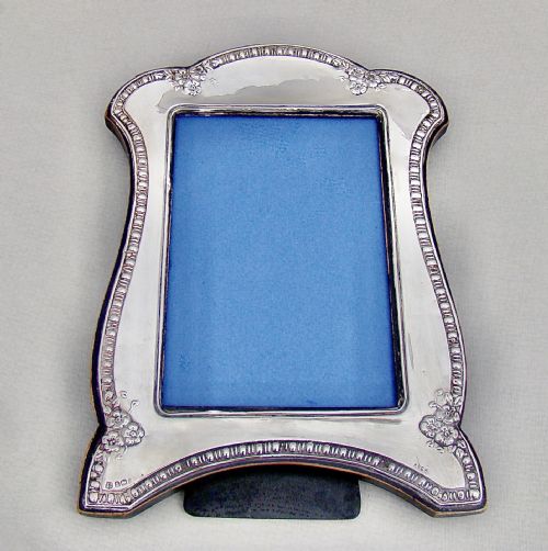 fig 3. DECORATIVE GEORGE V SOLID SILVER PHOTOGRAPH FRAME BY DEAKIN & SONS, BIRMINGHAM 1910