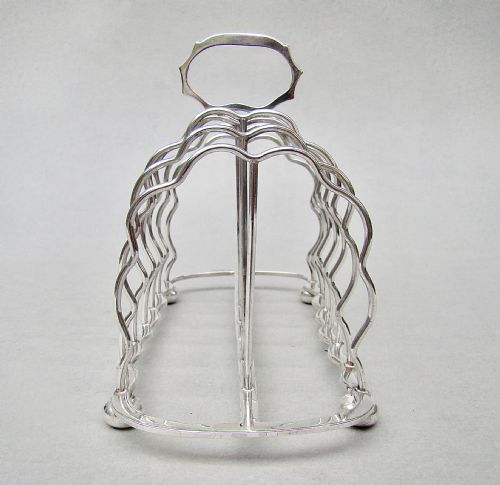 fig 2. GOOD EDWARDIAN SOLID SILVER TOAST RACK BY S. GARRARD, LONDON 1905