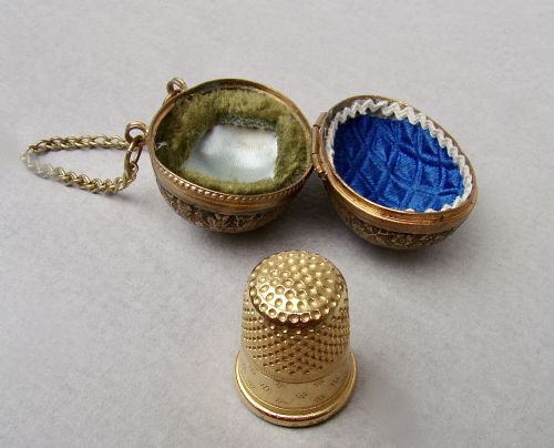 fig 1. EXQUISITE 19TH C. FRENCH GILT METAL THIMBLE IN ORMULU EGG-SHAPED HOLDER