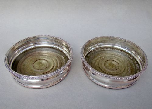 fig 2. PAIR OF TURN OF THE CENTURY SILVER PLATED WINE COASTERS, CIRCA 1910