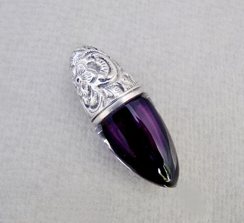 fig 1. RARE VICTORIAN SILVER AND AMETHYST GLASS BULLET SHAPED SCENT BOTTLE, CIRCA 1890