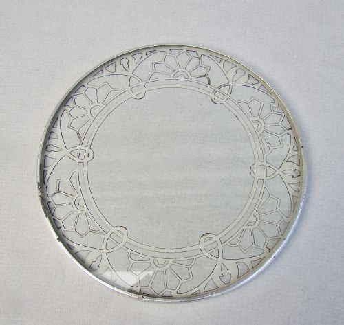 fig 2. UNUSUAL SILVER MOUNTED GLASS TEAPOT STAND, CIRCA 1930