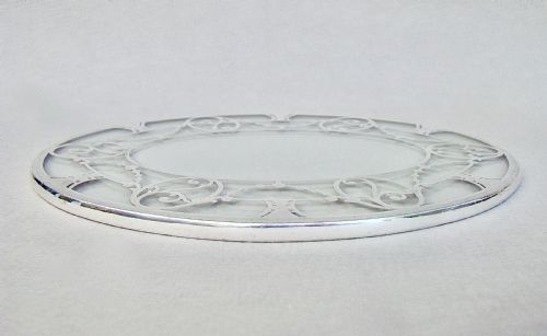 fig 1. UNUSUAL SILVER MOUNTED OVAL GLASS TEAPOT STAND, CIRCA 1930