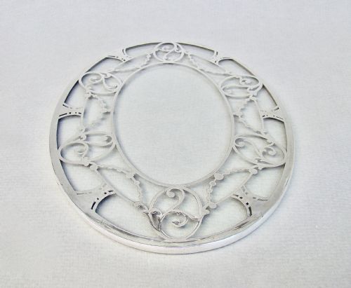 fig 2. UNUSUAL SILVER MOUNTED OVAL GLASS TEAPOT STAND, CIRCA 1930