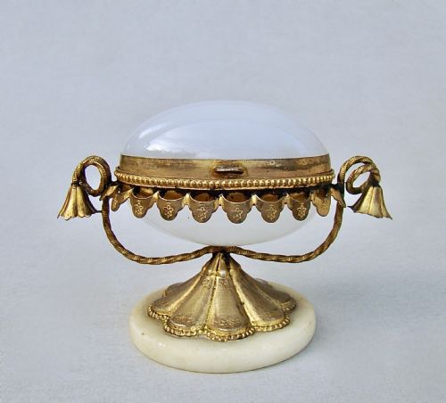fig 1. FRENCH PALAIS ROYAL EGG-SHAPED OPALINE GLASS CASKET WITH GILT ORMULU MOUNTS, CIRCA 1860