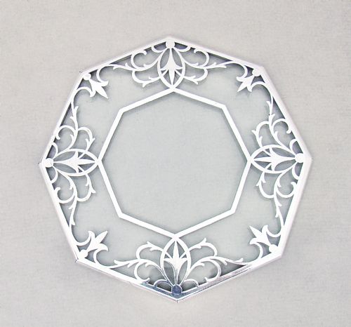 fig 1. UNUSUAL OCTAGONAL SILVER MOUNTED OVAL GLASS TEAPOT STAND, CIRCA 1930
