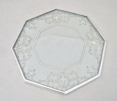 fig 2. UNUSUAL OCTAGONAL SILVER MOUNTED OVAL GLASS TEAPOT STAND, CIRCA 1930