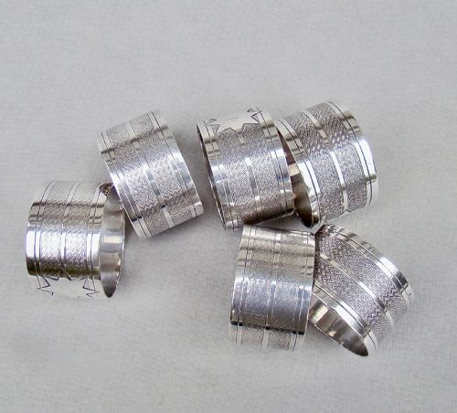 fig 2. CASED SET OF SIX VICTORIAN SILVER PLATED NUMBERED NAPKIN RINGS, CIRCA 1890
