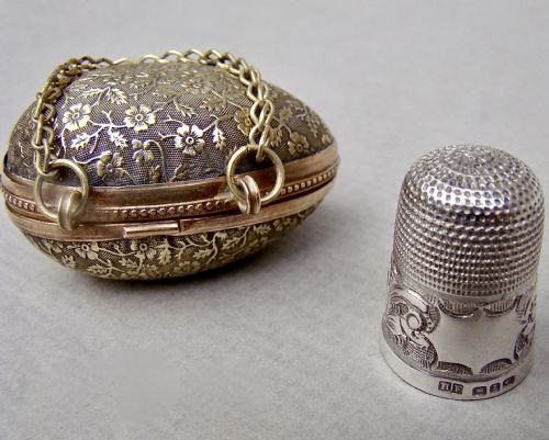 fig 3. EXQUISITE VICTORIAN SOLID SILVER THIMBLE CASED IN ORMULU CHATELAINE EGG-SHAPED HOLDER
