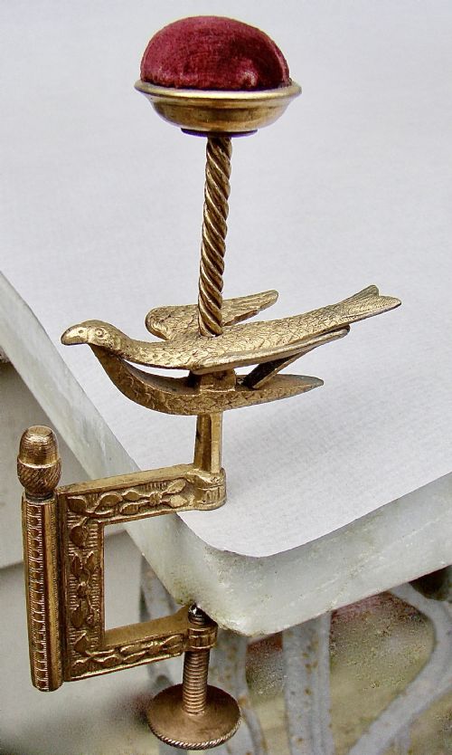 fig 1. CHARMING VICTORIAN GILDED METAL HEMMING BIRD SEWING CLAMP & PIN CUSHION, CIRCA 1850