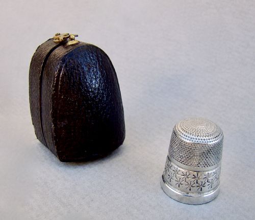 fig 1. CASED SILVER THIMBLE BY HENRY GRIFFITH & SONS LTD, BIRMINGHAM 1924

