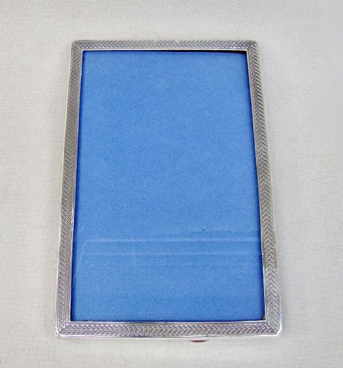 fig 1. ENGINE-TURNED SILVER PHOTO FRAME BY WILLIAM HASELER, BIRMINGHAM, 1918