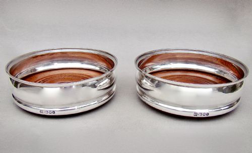 fig 1. PAIR OF MID-CENTURY SOLID SILVER WINE COASTERS BY J. PARKES & CO, LONDON 1965.