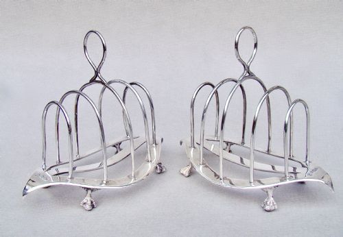 fig 1. GOOD PAIR OF VICTORIAN SOLID SILVER TOAST RACKS BY WILLIAM HUTTON & SONS, SHEFFIELD 1899