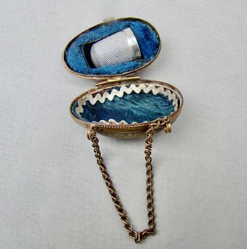 fig 2. EXQUISITE VICTORIAN SOLID SILVER THIMBLE CASED IN ORMULU CHATELAINE EGG-SHAPED HOLDER
