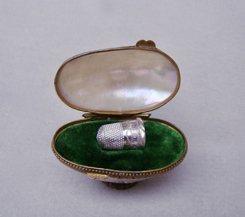 Rare 19th C. Miniature Silver Thimble for a Child in Mother of Pearl Egg-shaped Case.